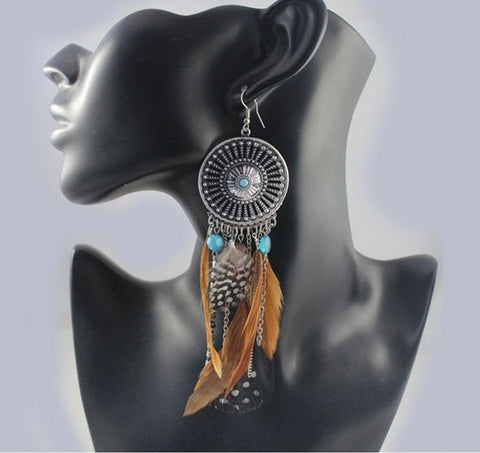 Hollow fringed feathers long paragraph earring