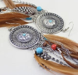 Hollow fringed feathers long paragraph earring